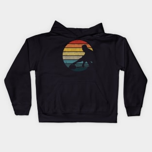 Curling Silhouette On A Distressed Retro Sunset graphic Kids Hoodie